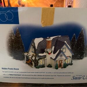 Department 56 Snowy Cottage with Green and Red Accents